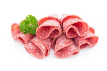 Salami sausage slices isolated on white background.
