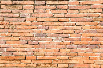 Red brick wall seamless background.