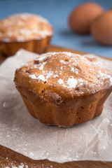 Fresh baked muffins, cakes, cupcakes for breakfast in a rural rustic style