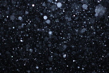 Real falling snow on a black background for use as a texture layer in your project. Add as...