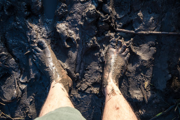foot in mud
