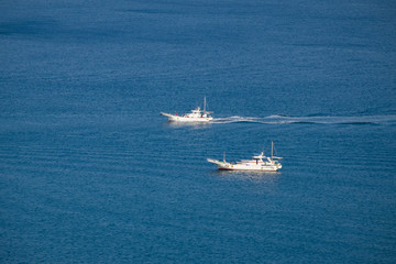 Yacht sailing in the middle of the sea