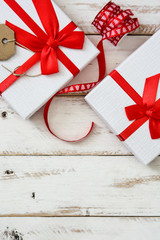 White gift box on white wooden background

