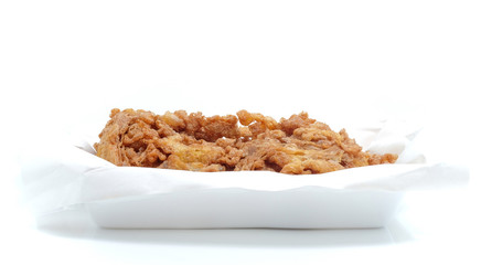 Omelet, fried until crisp on white background.