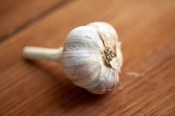 close up of garlic on wooden table