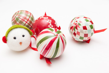 decorations of christmas tree, colorful balls and snowman on white backgrounds