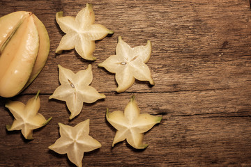 carambola on wood background 