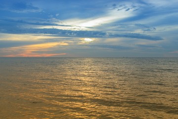 Fototapeta premium Sunrise Sea water and beach and sky. Cold Warm Filter look Colorful