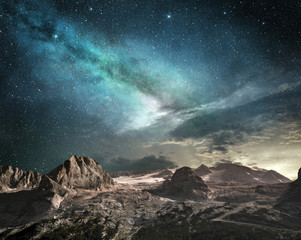 milky way at dawn on a mountain landscape