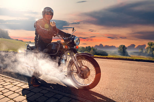 Fototapeta Classic Motorbike Rider With Smoke