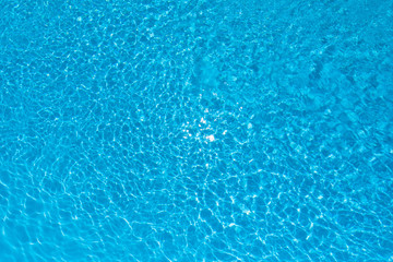 Fototapeta na wymiar Ripple water surface in swimming pool