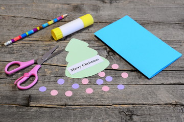 Christmas card tutorial. Step. Christmas tree and ornaments cut out of colored paper, pencil, glue...