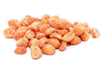 Bunch of peanuts with honey isolated on white