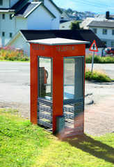 Vertical Norway telephone booth with light leak backdrop