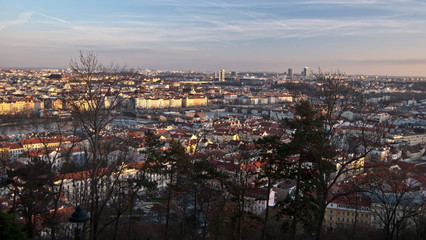 Prague city panorama from Petrin hill during late autumn day with blue sky