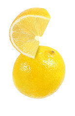 hanging, falling, hovering, flying piece of lemon fruits isolated on white background with clipping path