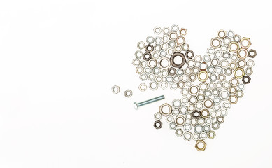 Heart shaped nuts and a bolt on white background with copy space, Right idea will get to the heart of customer Concept