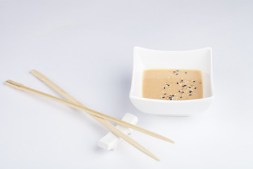 Japanese sauce with chopsticks