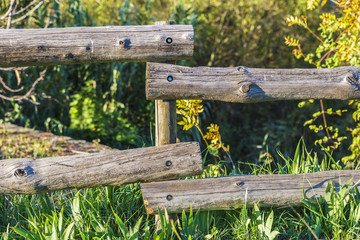 Old wooden fence in the field