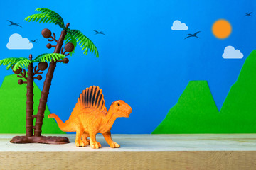 Spinosaurus toy model on wild models background © Noey smiley