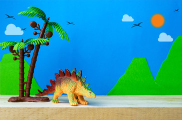 Stegosaurus toy model on wild models background © Noey smiley