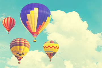 Hot air balloon on sun sky with cloud, vintage and retro instagram filter effect style