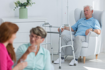 Obraz premium Disabled man with walker