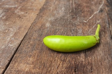 green eggplant. Solanum  Fresh veggies  on a wooden table.  