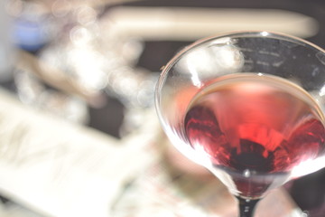 Pink alcohol cocktail in martini glass