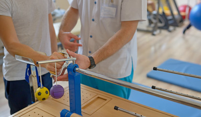 Obraz premium Hand therapy with physiotherapist