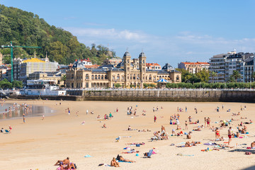 The Beach of La Concha, one of the most famous urban beaches in Europe. In the background the city hall, the former casino of Donostia San Sebastian