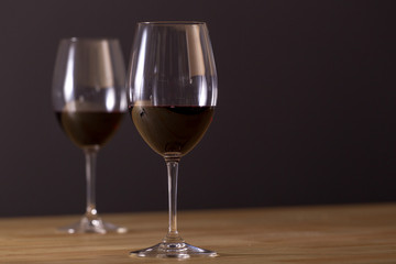 Glasses of red wine placed on the table