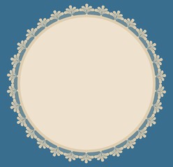 Beige round frame with lacy side on blue background.