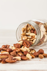 Mix of different nuts closeup photo