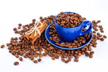 A coffee mug of coffee beans