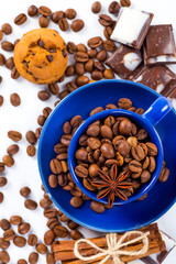 Coffee cup and beans on a white background.