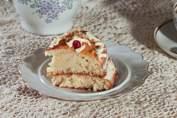 Homemade cake in white plate and tea