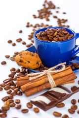 Coffee cup and beans on a white background.