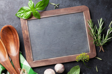 Blackboard for your text and garden herbs