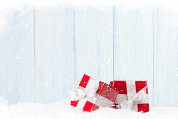 Christmas gift boxes with snow