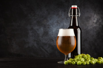 Beer glass on dark background