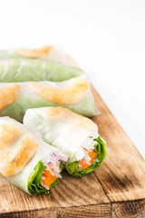 Vietnamese rolls with vegetables, rice noodles and prawns isolated on white background

