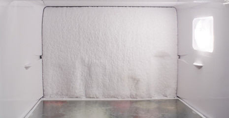 Ice formation on the inner surface of the refrigerator is the result of the failure - obrazy, fototapety, plakaty