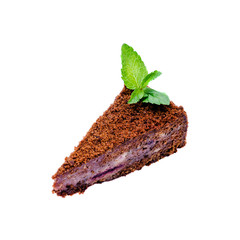 Delicious dark chocolate cake with cream and green mint isolated on a white background. Sweet tasty food, coffee break concept.