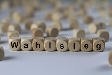 Wahlsieg - Holzwürfel mit Buchstaben