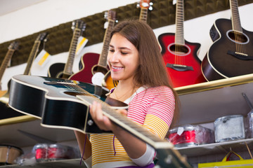 Customer buying new guitar