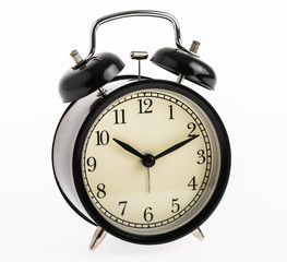 Black alarm clock isolated on white background