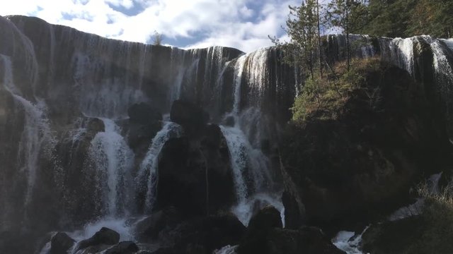 Pearl Shoal Waterfalls at Jiuzhaigou National Park  lake,  The UNESCO World Heritage in Sichuan , China in  Autumn  in November  located in  in  Tibetan-Qiang of Sichuan ,China