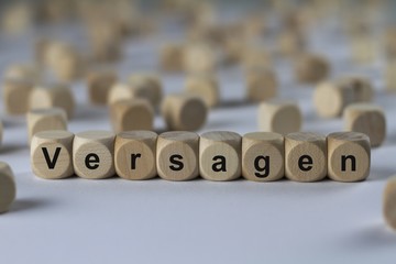Versagen - Holzwürfel mit Buchstaben