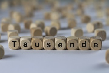 Tausende - Holzwürfel mit Buchstaben